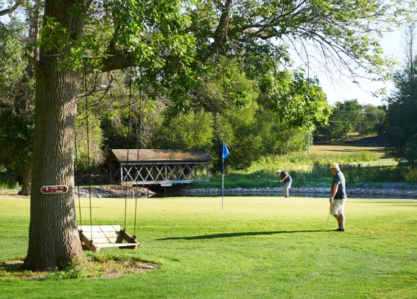 Guests enjoying a round on Limestone Bay's private golf course